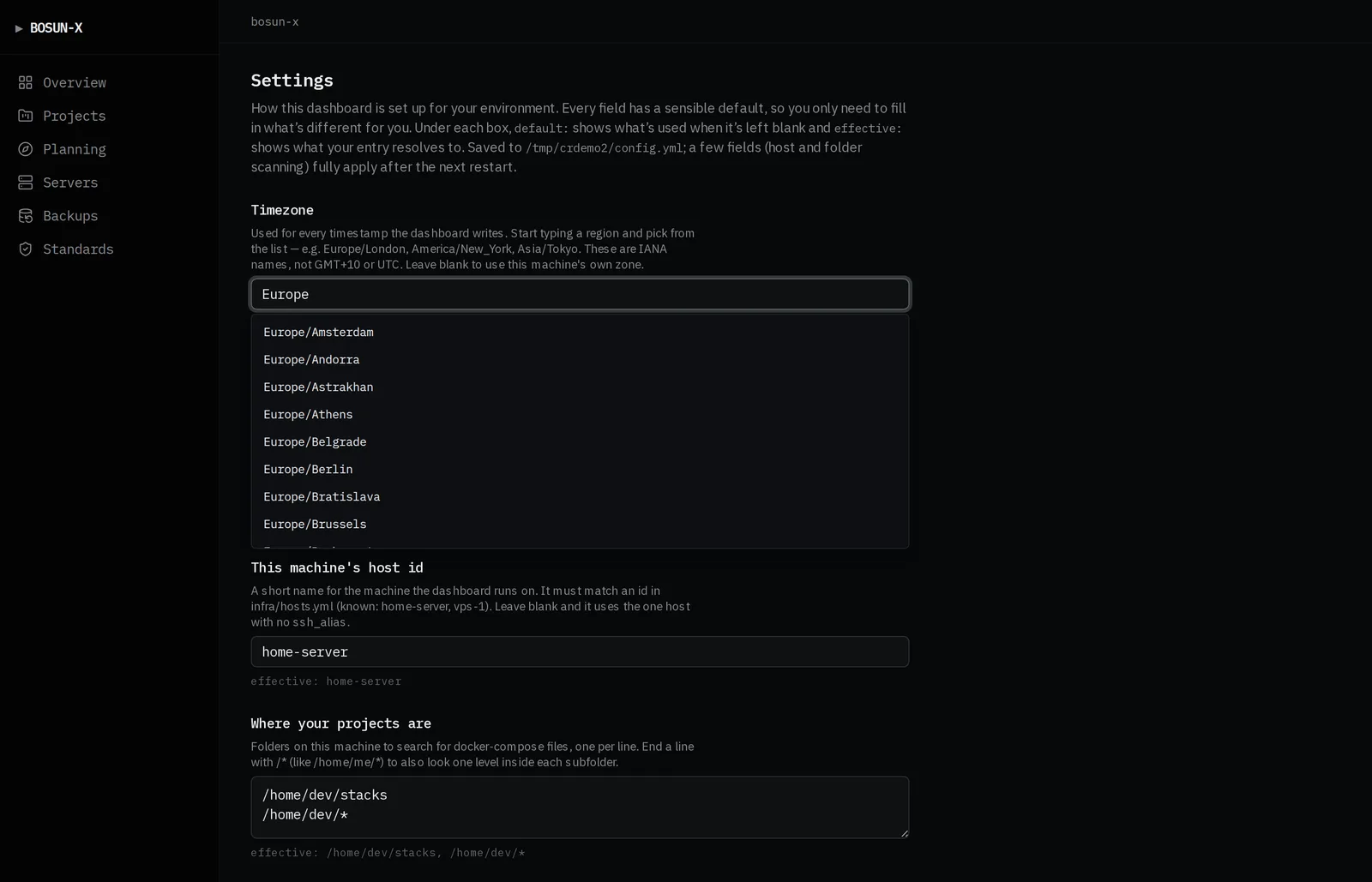 The dashboard Settings page with the timezone field open, showing a filtered list of IANA zone names, plus the operators, host id and project-folder fields.